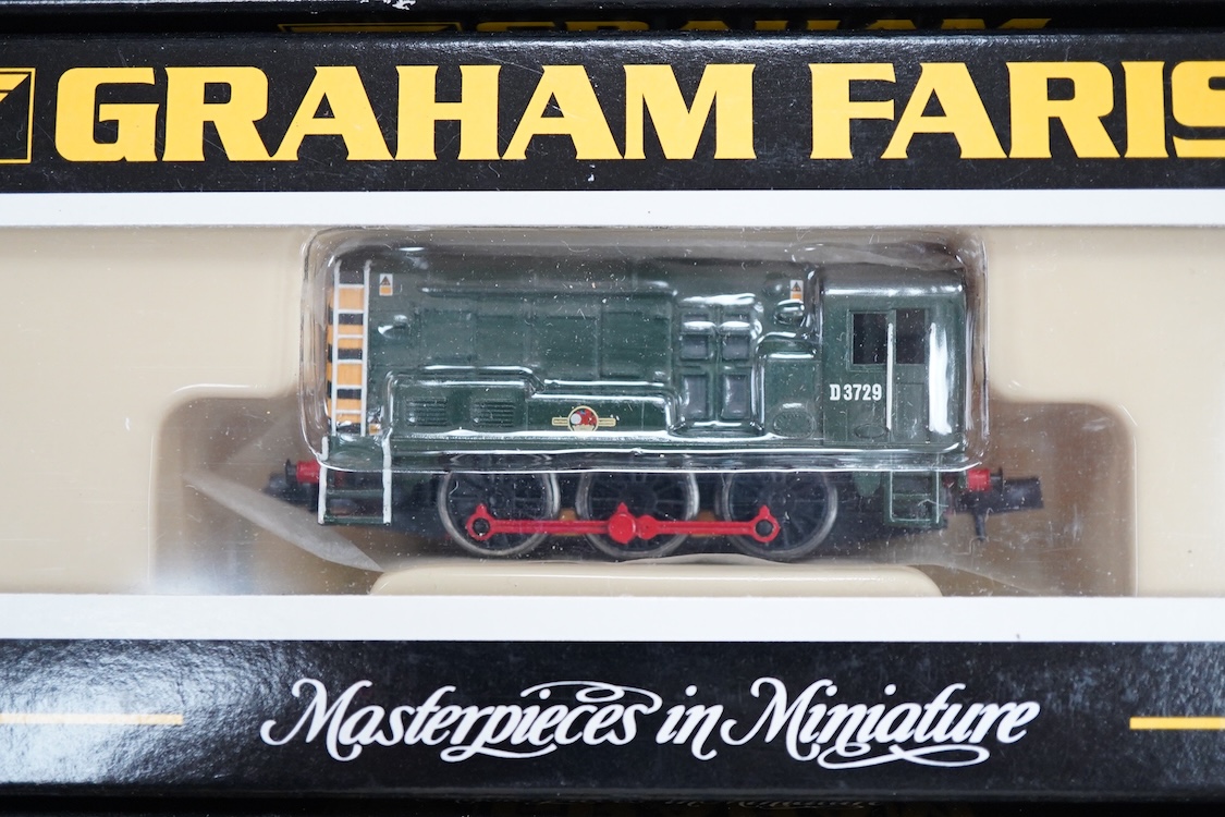 Four boxed Graham Farish N gauge railway Class 08 0-6-0 diesel locomotives; a BR, D3729 (371-001), a BR Railfreight, 08 834 (1008), an EWS, 08921 (100G) and a Thomas 1, 08500 (1006).
